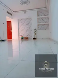 Two bedrooms and a living room for annual rent in Orient Towers, Ajman, with private parking, comfor