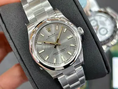 This Rolex Oyster Perpetual 31 features a silver dial and a stainless steel