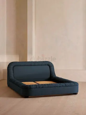 Low-profile upholstered double bed frame in dark blue (no mattress)