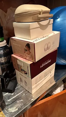 Used like new Momcozy breast pump + accessories in original boxes + eufy