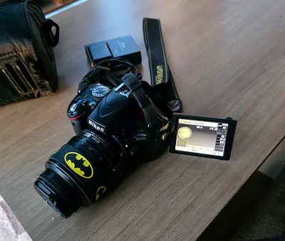 Nikon D5100 DSLR with 50mm - two batteries [WTS]