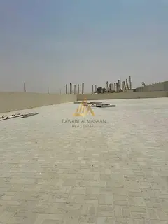 Prime 20,000 Sq. Ft. Interlocked Open Yard with Office & 25 kW Power in Al Sajaa Industrial Area