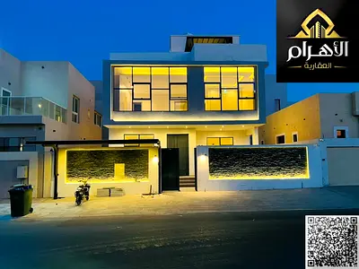 تصميم عصري ولايف ستايل متميز! فيلا راقية (G+1+R) مع جلسات خارجية وشلال للبيع في الزاهية – عجمان إذا كنت تدور على بيت يجمع بين الاستغلال الذكي للمساحة