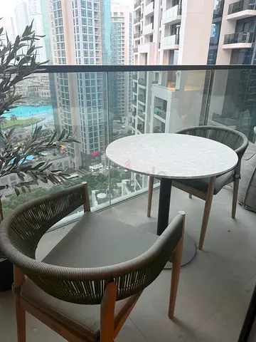 Small round balcony table with two rope-woven chairs - set of 3