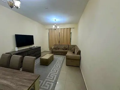 Furnished two-bedroom apartment with living room for monthly rent in Al Qasimia Station, Sharjah