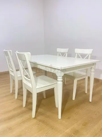 Extendable dining table and 4 chairs for sale