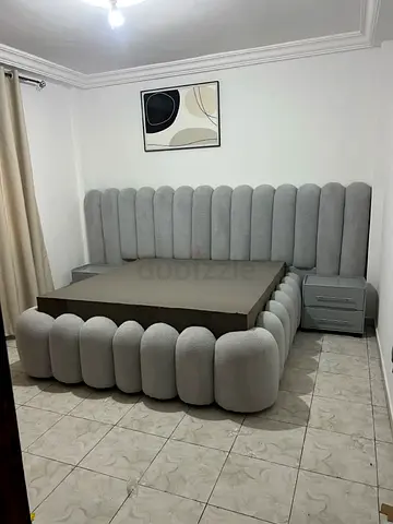 Light grey upholstered king-size