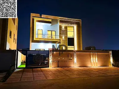 Direct from the owner, including all ownership fees: a villa in one of Ajman's most luxurious villas, built and finished to a super deluxe standard, w