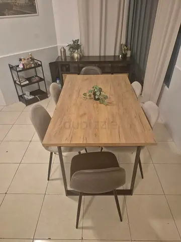 Wooden dining table with 6 chairs - only bought 8 months ago. Perfect condition