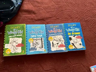 Diary of a Wimpy Kid set - 4 paperback books (Last Straw, Cabin Fever, Rodrick Rules, The Getaway)