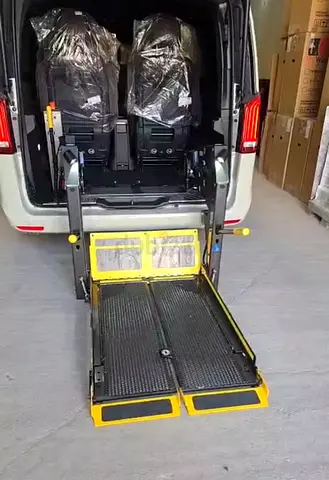Van-mounted hydraulic wheelchair lift / mobility ramp - good working condition.