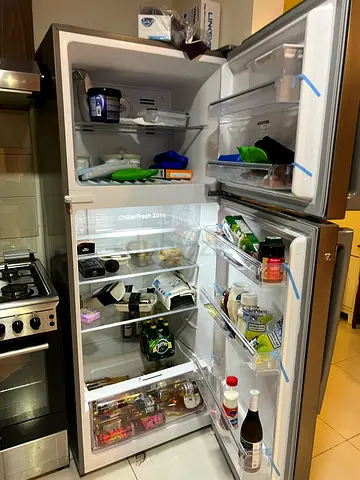 Used double-door refrigerator in good working condition