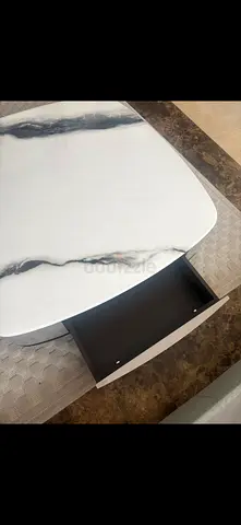 Marble-effect coffee table with storage drawer — Brand New condition.