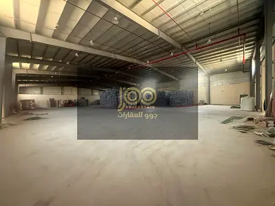 A fully integrated facility combining a warehouse, open yard, and labor accommodation