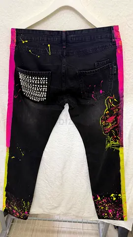 Black distressed jeans with pink side stripes and studded pocket, size approx M/L Phillip plein
