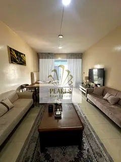 2 Bedrooms Hall Furnished for Annual Rent in Horizon Towers Ajman Very Large Space Balcony Open View
