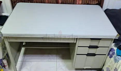 Used metal office desk with storage drawers, good condition