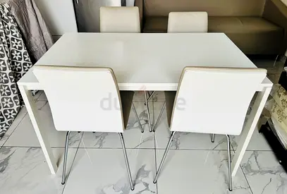 White Dining Table with Four Chairs