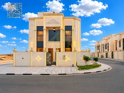 A luxurious classic-style villa in Al Helio 2, Ajman (two floors + roof), price includes registration and transfer fees. Strategically located on Shei