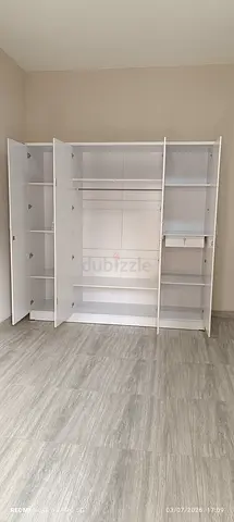 We are selling 4 door wood wardrobe brand new available