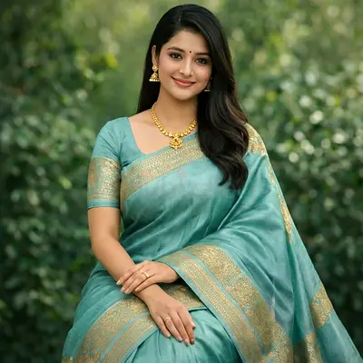 Light Teal Silk Saree with Gold Zari Border