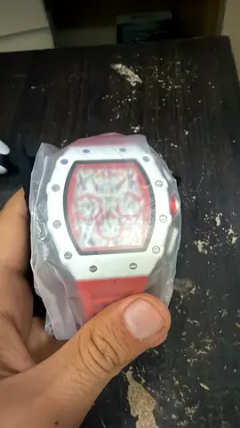 Red men's sport wristwatch — new/unused condition