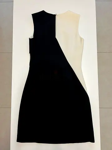 Black and white sleeveless knee-length sheath dress
