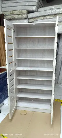 we are selling double door wood shoe rack brand new available