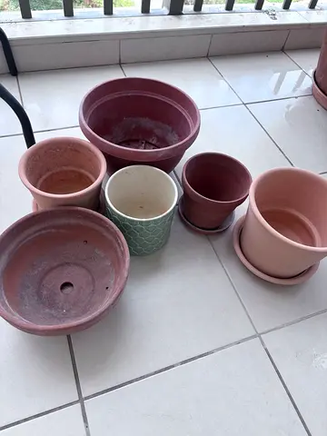Set of assorted plant pots and saucers - used, good condition (all ceramic, except one - plastic)