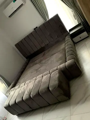 Large upholstered platform bed with headboard