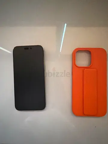 iPhone 12/13/14 style with orange MagSafe case (good condition)