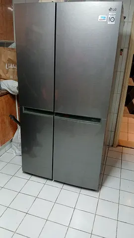 Lg latest new model side by side 4 door fridge same like new condition for sale