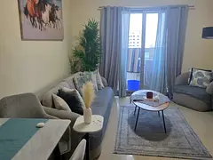 One bedroom and living room / Furnished with hotel-style furniture / View / Sharjah