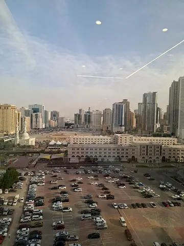 2 bedrooms and a living room with a view of Al Qasba Includes free parking Spacious layout Central air conditioning and central gas Security deposit v