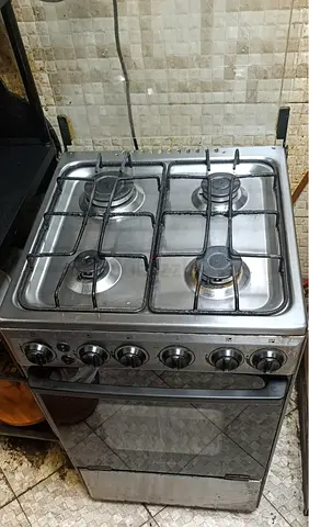 GEEPAS 55X55 CMS - Used 4-Burner Stainless Steel Free-Standing Gas Cooker with Oven