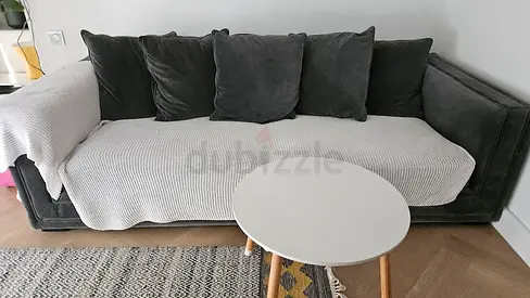 THEONE  3-seater sofa in great condition and at low price. Free blankets throws and a coffee table!