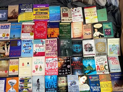 Mixed collection of used fiction and nonfiction books — assorted titles