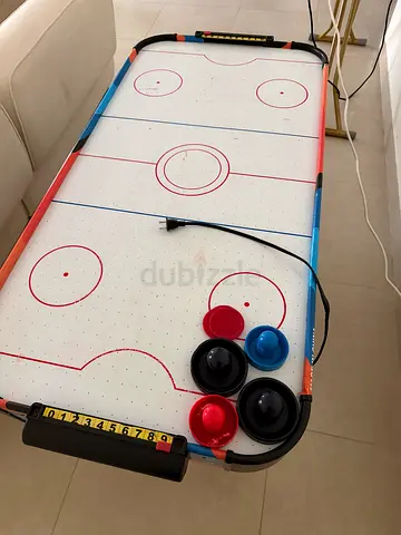 Air hockey table game (small indoor) with pucks and pushers