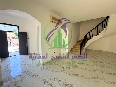 Spacious Four Bedroom Villa for Rent with Two Majlis Maid Room Covered Parking and Balconies