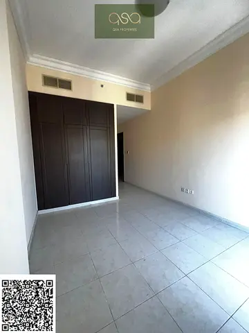 Empty apartment with Parking | Free Gym | Free Pool | Built-in Wardrobes 2 BHK for sell in Emirates City Ajman