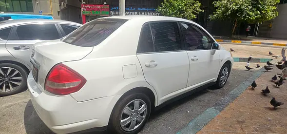 2006 Nissan TIIDA — фото 4