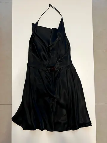 Black satin halter-neck evening dress, size unknown