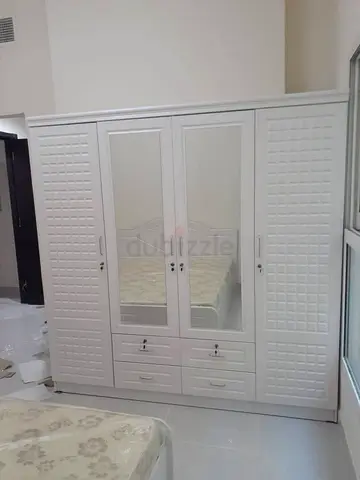 White 4-Door Wardrobe with Mirrors and Drawers - Brand new