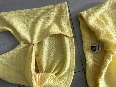 Light yellow textured two-piece women’s set (top + skirt) - size small