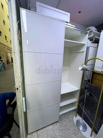 White Sliding Door Wardrobe with Shelves and Hanging Rail - Good Condition