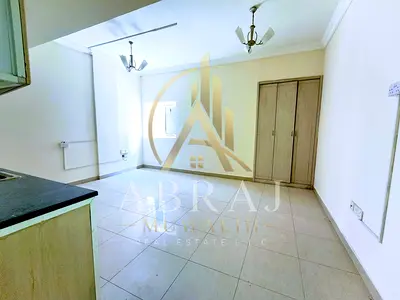 Spacious Studio with wardrobes and central AC in G + 7 building in muwaileh with reasonable price