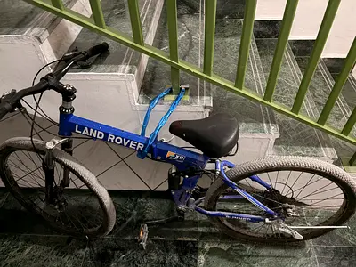 Used Land Rover blue mountain bike - good condition