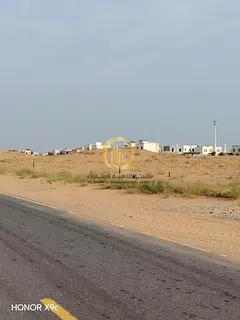 For sale: two adjacent residential plots in Al-Sahmo with a permit for ground and two floors, with f