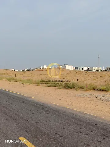 For sale: two adjacent residential plots in Al-Sahmo with a permit for ground and two floors, with freehold ownership available for all Arab