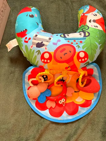 Baby pillow with toys